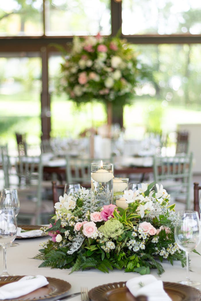 about-03 Stunning floral centerpiece and candles at a wedding in São Paulo, Brazil.
